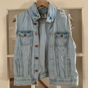 Distressed denim vest